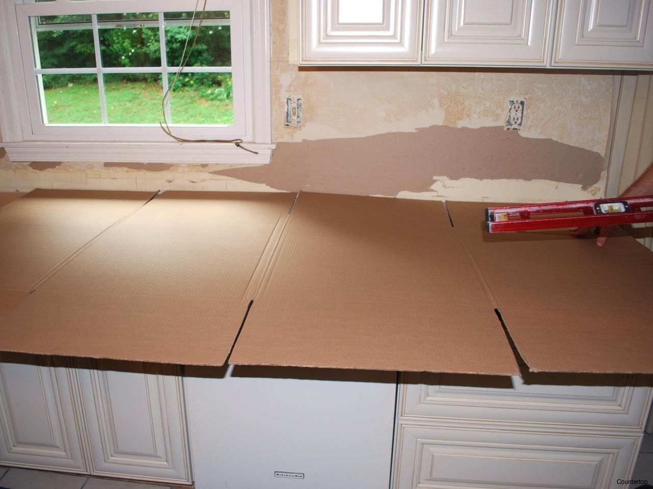 How to support granite countertop over dishwasher